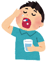 薬を飲む男性
