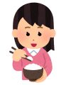 ごはんを食べる女性